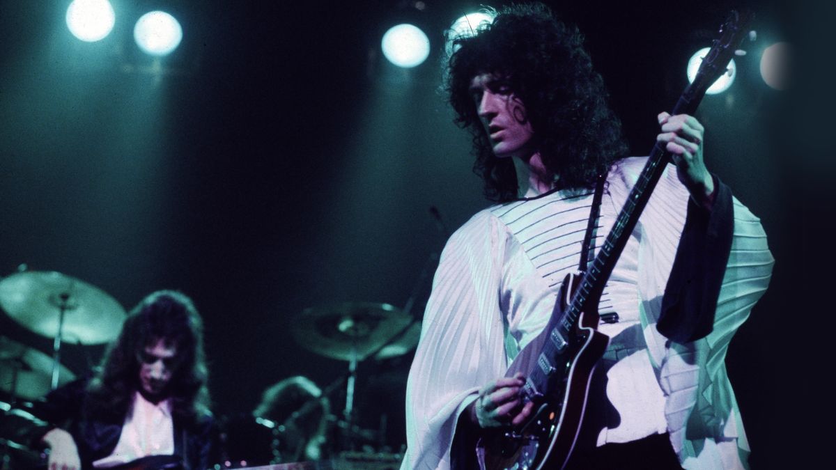 Brian May of British rock band Queen in concert in London, 1974