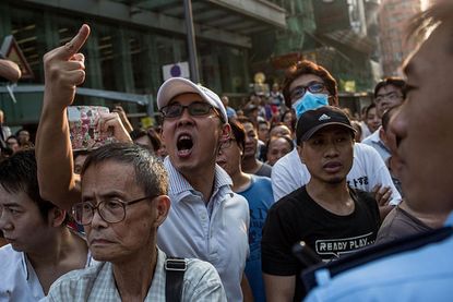 Pro-government mob destroys protest site in Hong Kong
