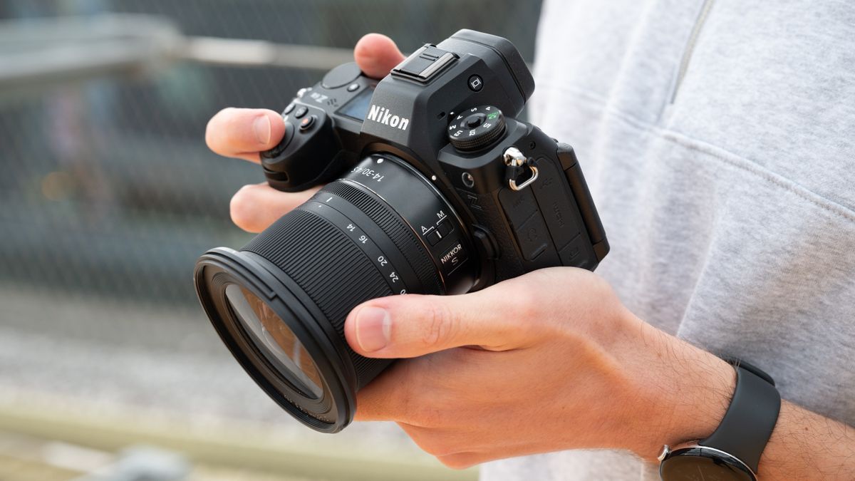 Nikon Z6 III camera held in a pair of hands