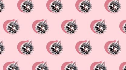 Rows of disco balls on a pink background