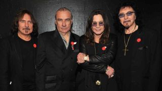 Black Sabbath posing for a photograph in 2011