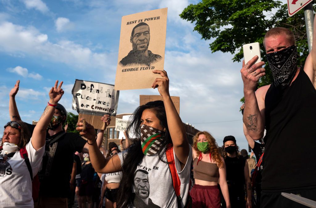 Protesters confront police outside the 3rd Police Precinct on May 27, 2020 in Minneapolis, Minnesota