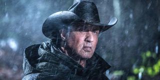 Rambo Last Blood Sylvester Stallone John Rambo in cowboy hat at night in the rain