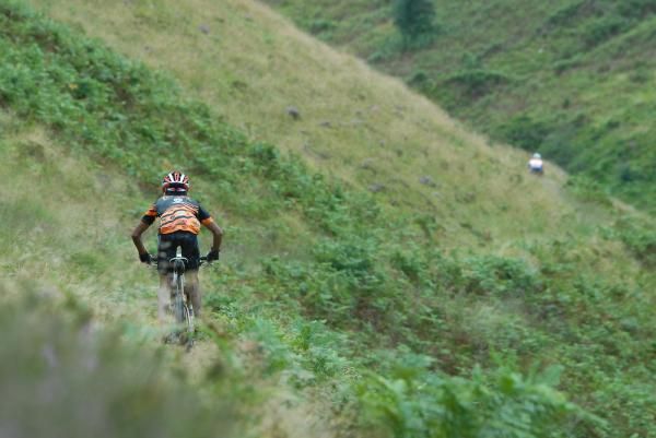 Ajay Chhatri (Torq) gunning it elbows-out on the singletrack