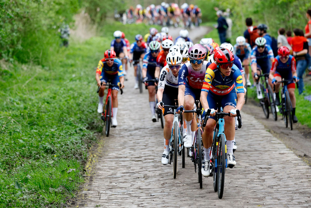 ROUBAIX FRANCE APRIL 06 LR Pfeiffer Georgi of The United Kingdom and Team dsmfirmenich PostNL Jeanne Korevaar of The Netherlands and Team Liv AlUla Jayco and Ellen van Dijk of The Netherlands and Team Lidl Trek lead the peloton during the 4th ParisRoubaix Femmes 2024 a 1485km one day race from Denain to Roubaix on UCIWWT April 06 2024 in Roubaix France Photo by Etienne Garnier PoolGetty Images