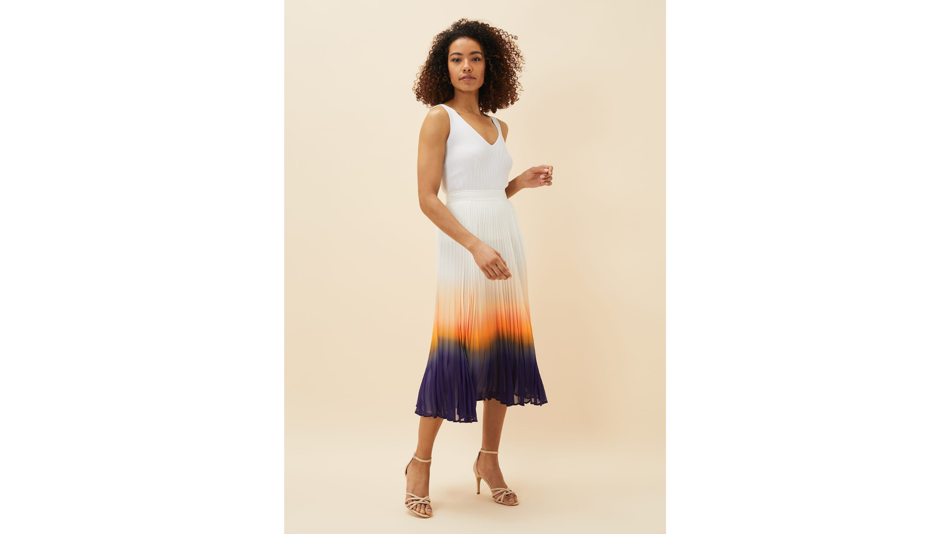 model wearing Phase Eight Raya Pleated Dip Dye Skirt