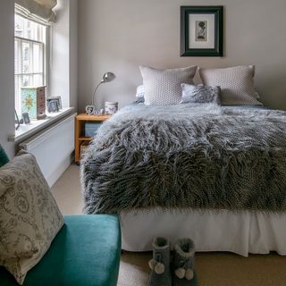 bedroom with faux fur blanket