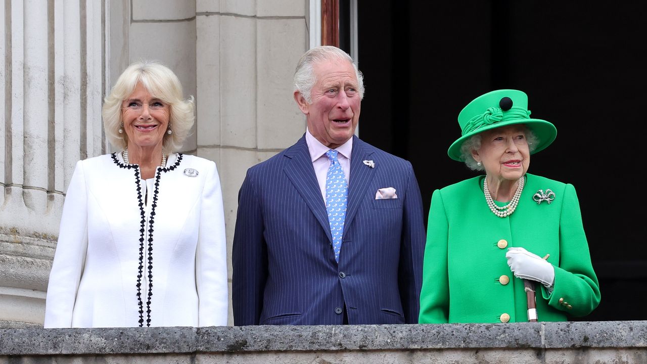 King Charles III, Queen Camilla and Queen Elizabeth II on the Buckingham Palace balcony