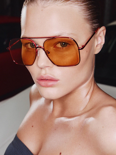 Le Specs sunglasses with an orange glass and bronze frame