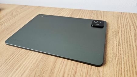 The Xiaomi 8 Pro on a desk