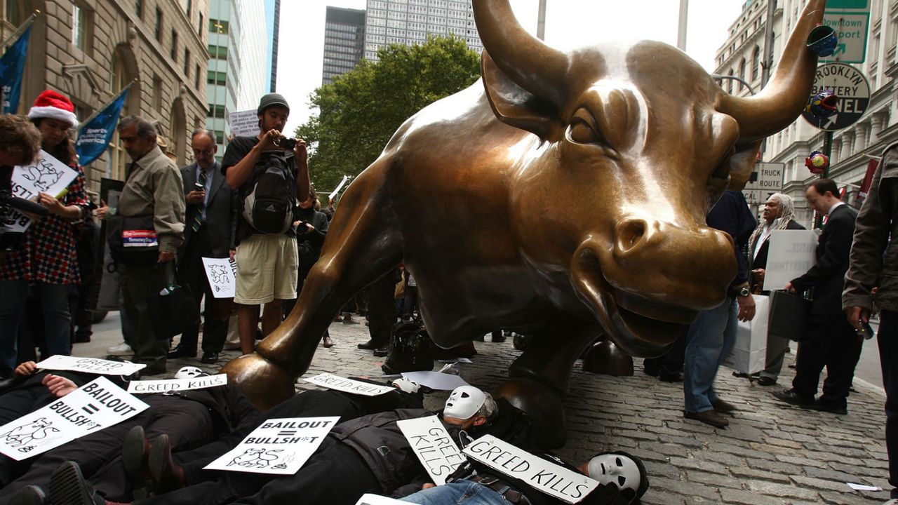 Wall Street&amp;#039;s famous bull is a focus for protesters 