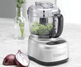 Cuisinart Mini Prep Pro Food Processor on the countertop with onion beside it