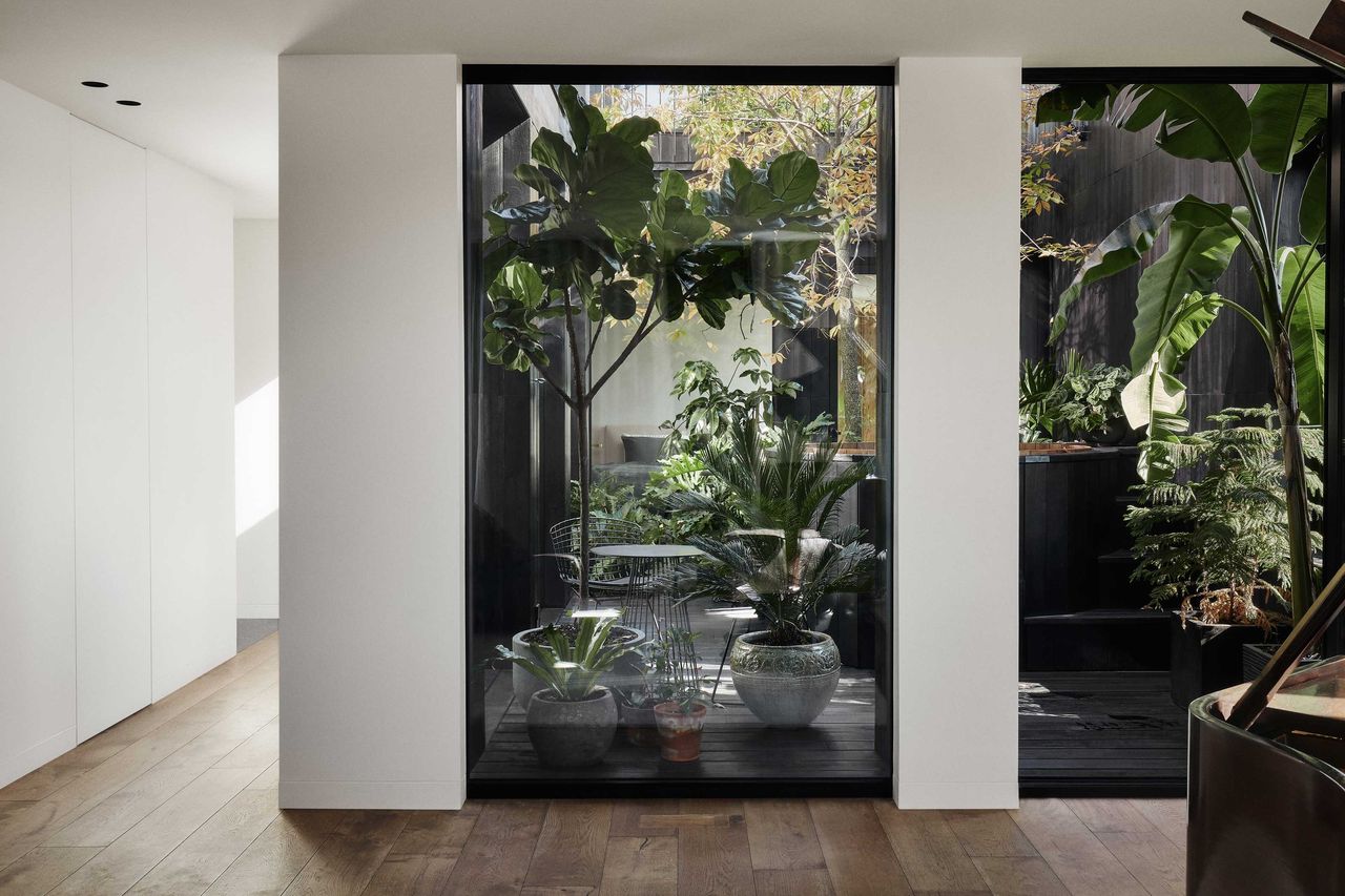 a patio with potted plants on it