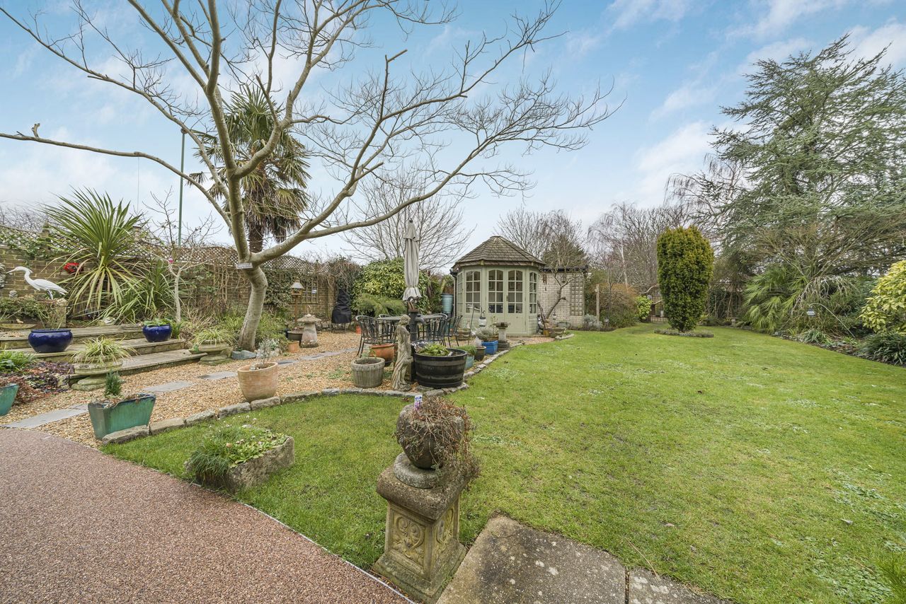 Images of the interiors and exteriors of The Thatched Cottage, Nutbourne