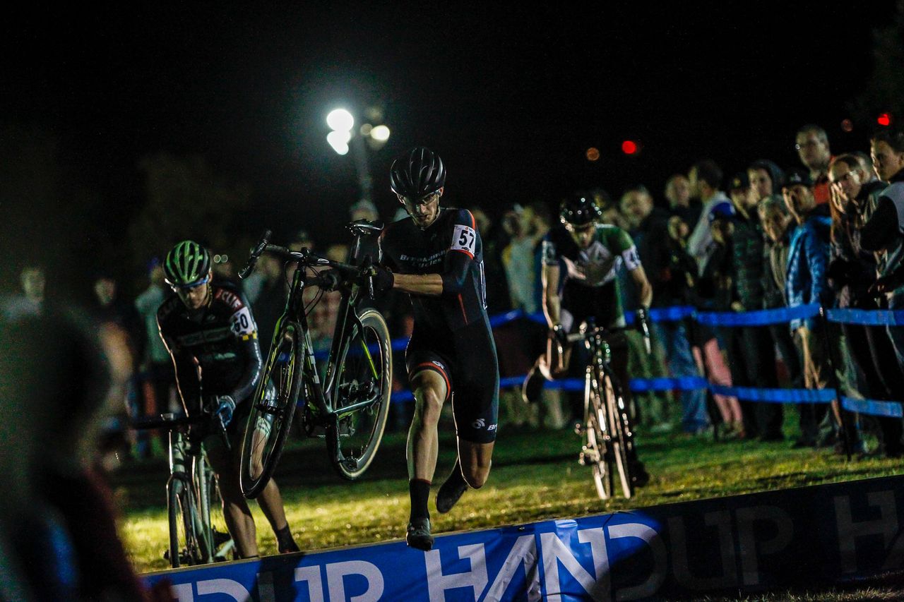 The men hit the barriers on the first lap