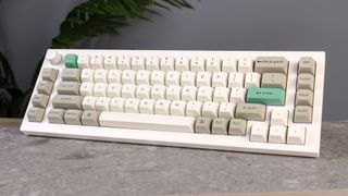 A shell white Keychron Q65 Max wireless mechanical keyboard