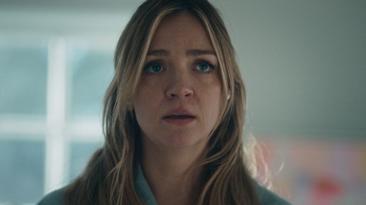 A close up of Natalie looking worried in The Bear season 4
