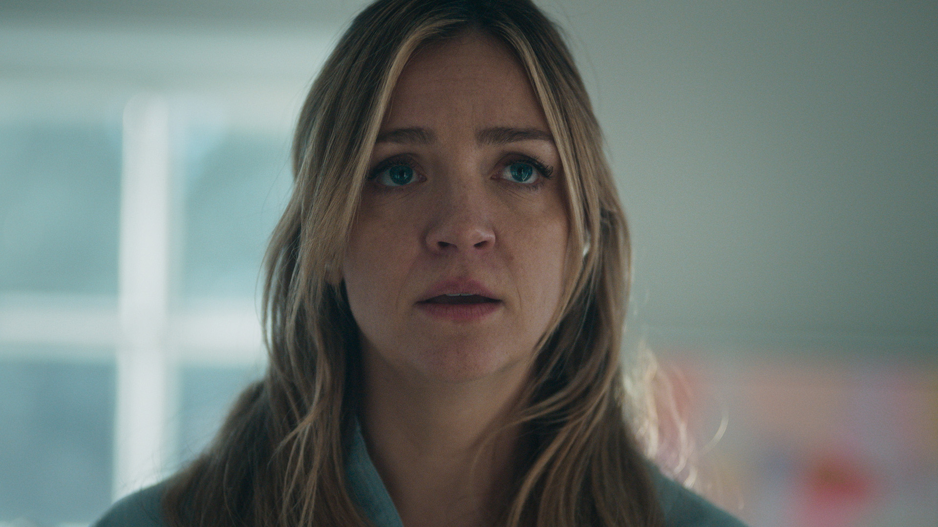 A close up of Natalie looking worried in The Bear season 4
