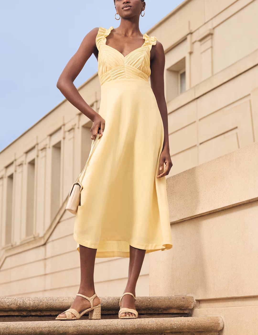Image of butter yellow dress