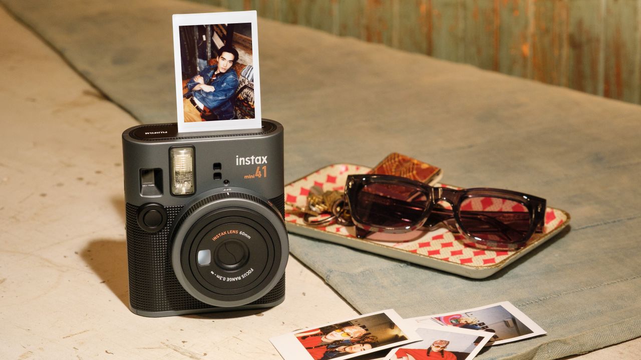 Fujifilm Instax Mini 41 instant camera and prints
