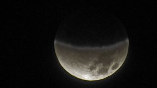 Total lunar eclipse photos from Phoenix, Ariz., by Charles Jones
