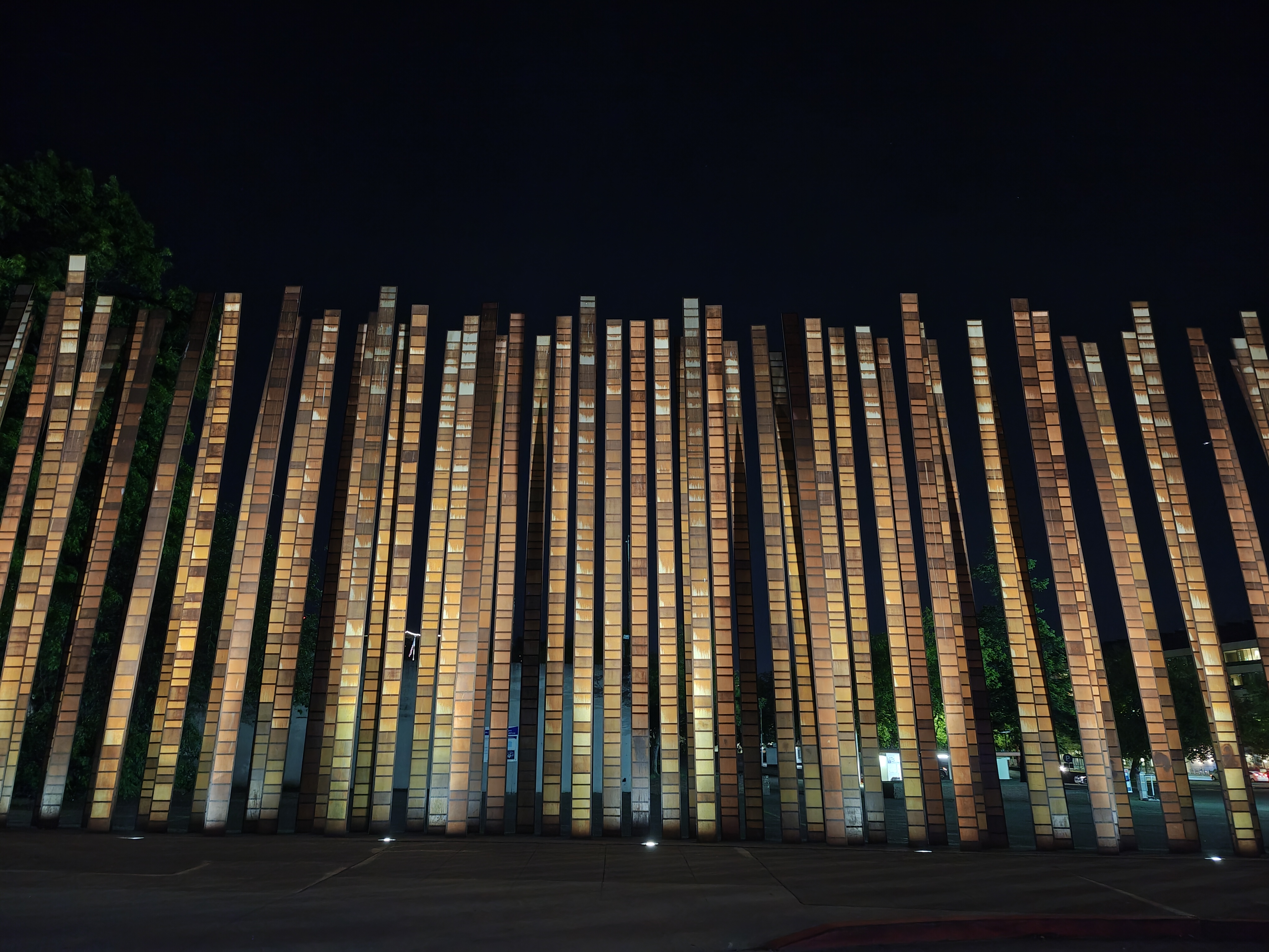 Tall pillars lit up at night