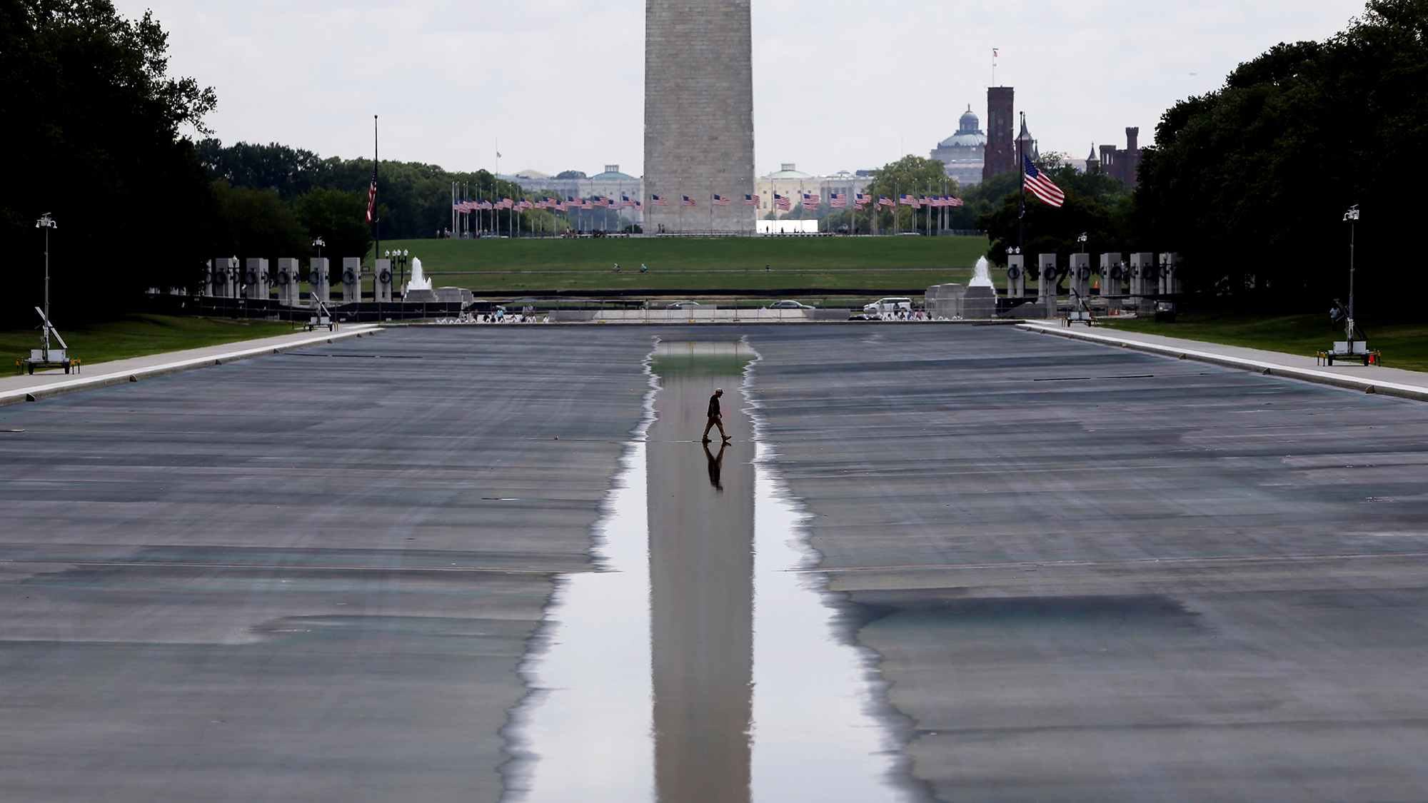 The Washington Monument is seen reflected in the drained Lincoln Memorial Reflecting Pool, in Washington, D.C.