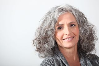 Older woman with frizzy hair