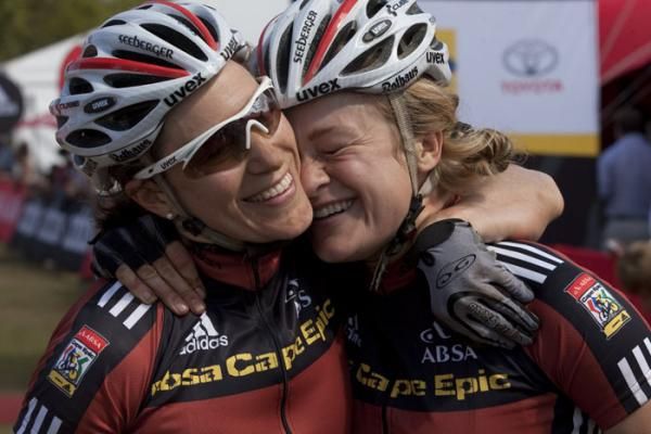 Kristine and Anna-Sofie Noergaard of Team Rothaus-Cube celebrate their amazing victory as overall womens winners after the final stage (stage eight) of the 2010 Absa Cape Epic Mountain Bike stage race held in and around Oak Valley in the Western Cape, South Africa.
