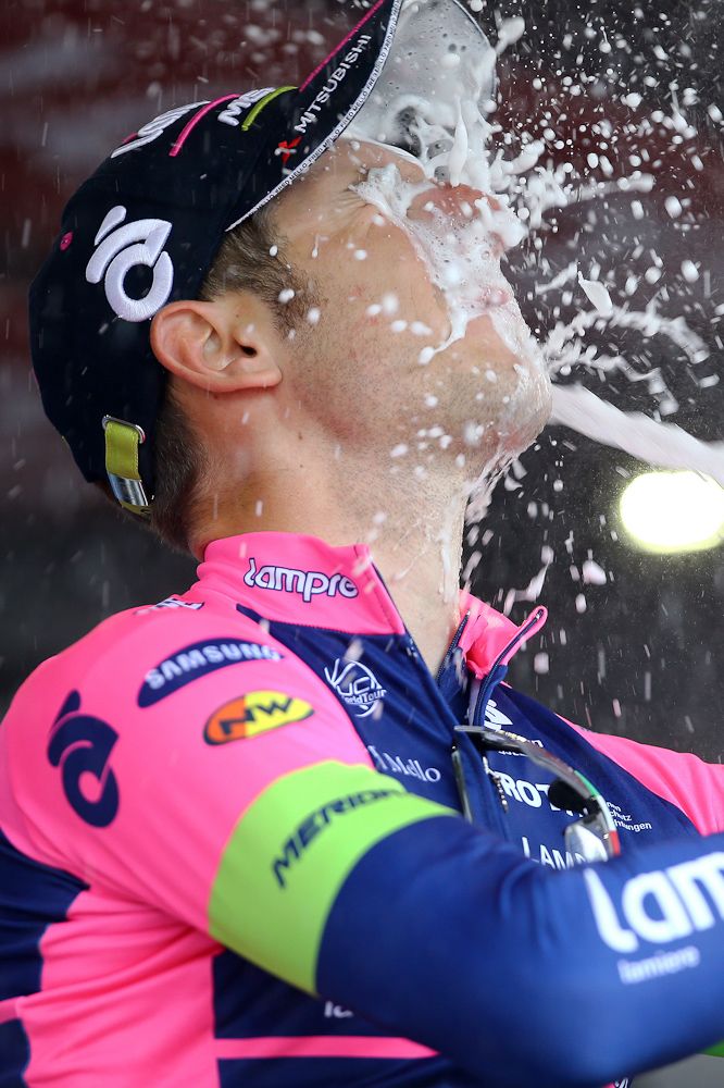 Sacha Modolo soaks himself with victory champagne.