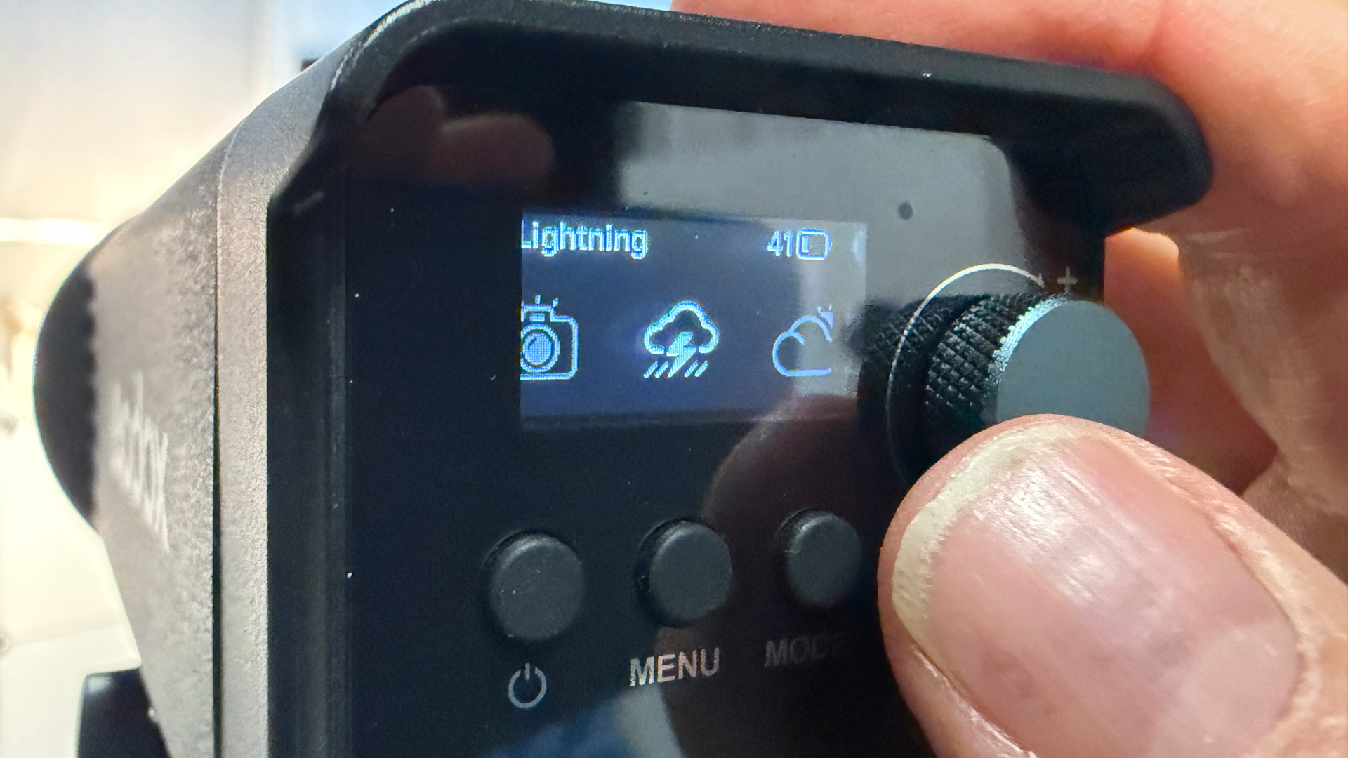 Shot of the OLED display showing icons for various animated effects including Flash, Lightning, and Cloudy.
