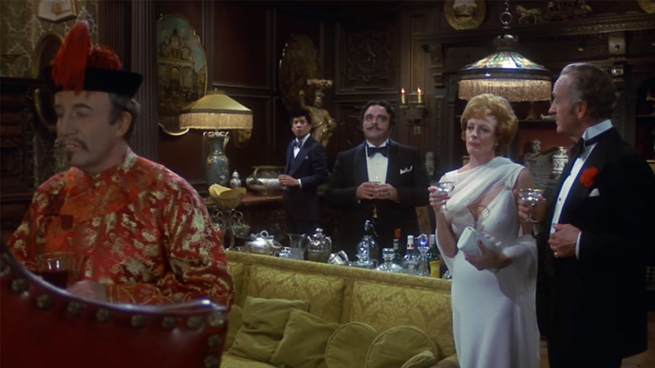 The cast of Murder by Death dressed up for dinner in a scene from the movie. 