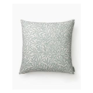 throw pillow with light blue floral pattern