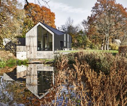 barn-style new build with zinc and chestnut wood cladding