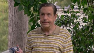 Kripke watering his yard. 