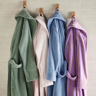 Brooklinen bathroom towel collection new in bright pink and purple colors 