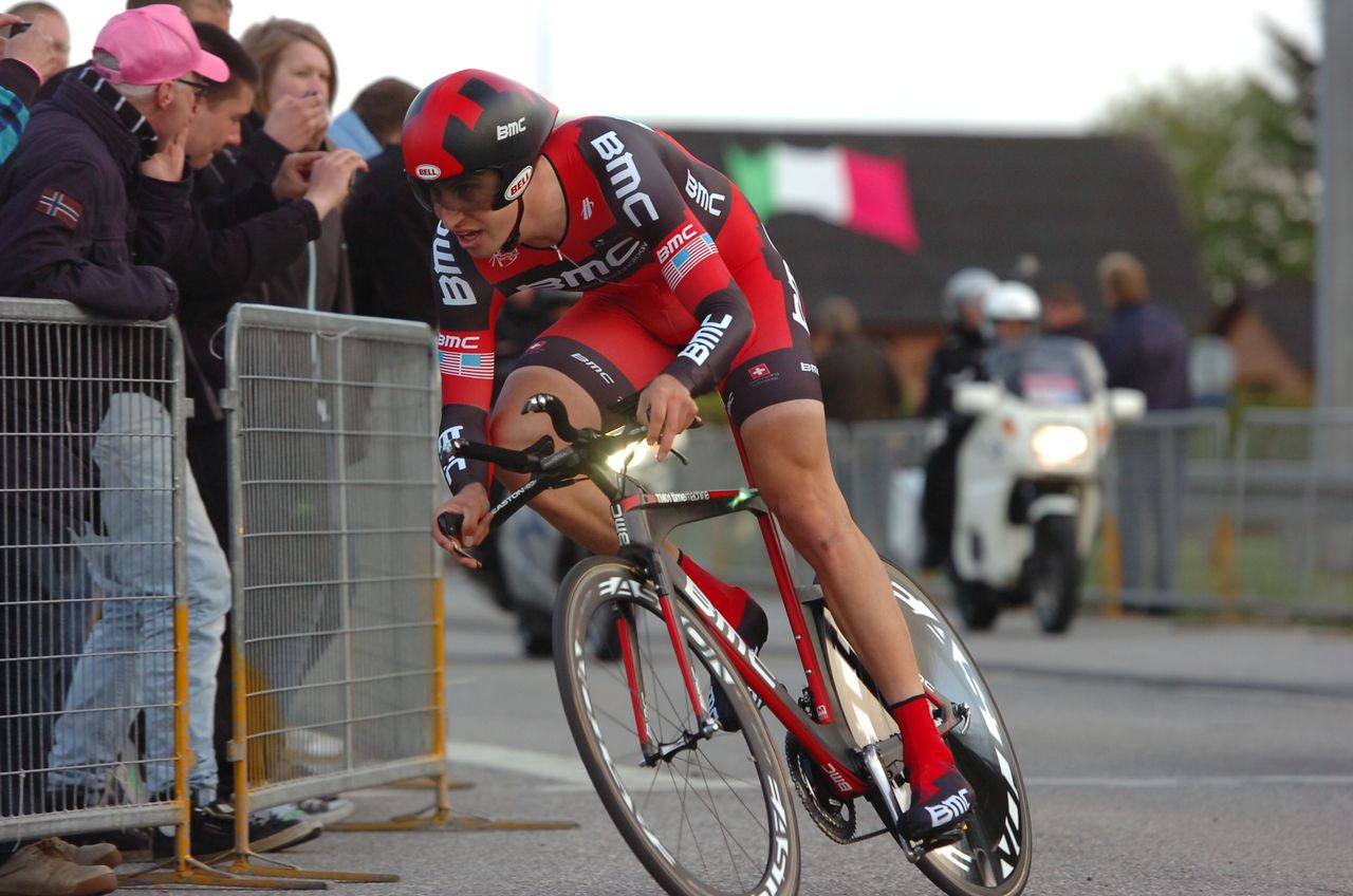 A 21-year-old Taylor Phinney attacks a corner in Herning, Denmark, on the opening day in 2012. He beat a 25-year-old Geraint Thomas by 9 seconds over 8.7km