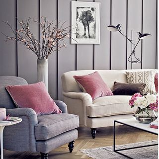living room with three seater sofa in canvas pure belgian linen armchair in pewter pure belgian linen and velvet cushions