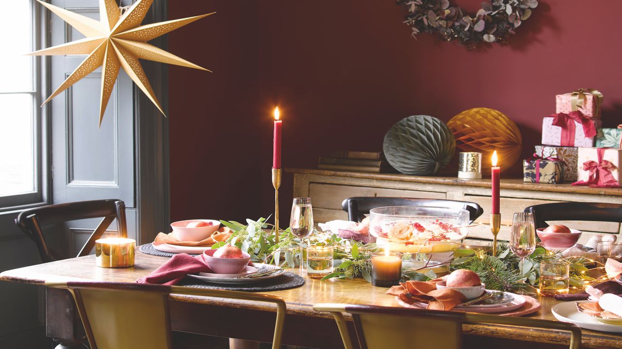 Christmas dining table with decorations and candles