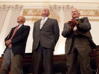 Apollo 11 astronauts, from left, Michael Collins, Neil Armstrong and Buzz Aldrin stand during a recognition ceremony at the U.S House of Representatives Committee on Science and Technology tribute to the Apollo 11 astronauts at the Cannon House Office Building on Capitol Hill, Tuesday, July 21, 2009, in Washington. The committee presented the three Apollo 11 astronauts with a framed copy of House Resolution 607 honoring their achievement, and announced passage of legislation awarding them and John Glenn the Congressional Gold Medal.