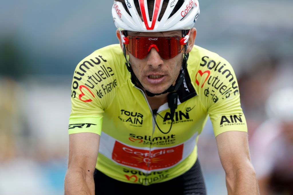 LLEX FRANCE AUGUST 11 Guillaume Martin of France and Team Cofidis Yellow Leader Jersey crosses the finish line during the 34th Tour de lAin 2022 Stage 3 a 131km stage from Plateau dHauteville to Llex 904m TDA22 on August 11 2022 in Llex France Photo by Bas CzerwinskiGetty Images