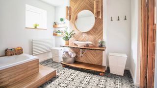 bathroom with wood cladding and patterned floor tiles