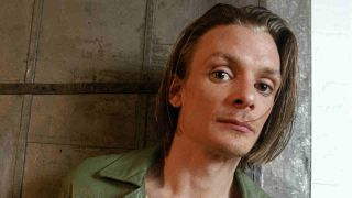 Chris Whitley posing for a photograph in 1995