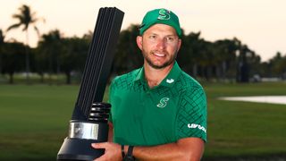 Dean Burmester with the LIV Golf Miami trophy