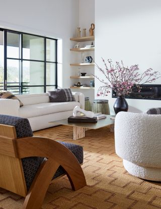 small white living room with boucle white sofa by K Interiors