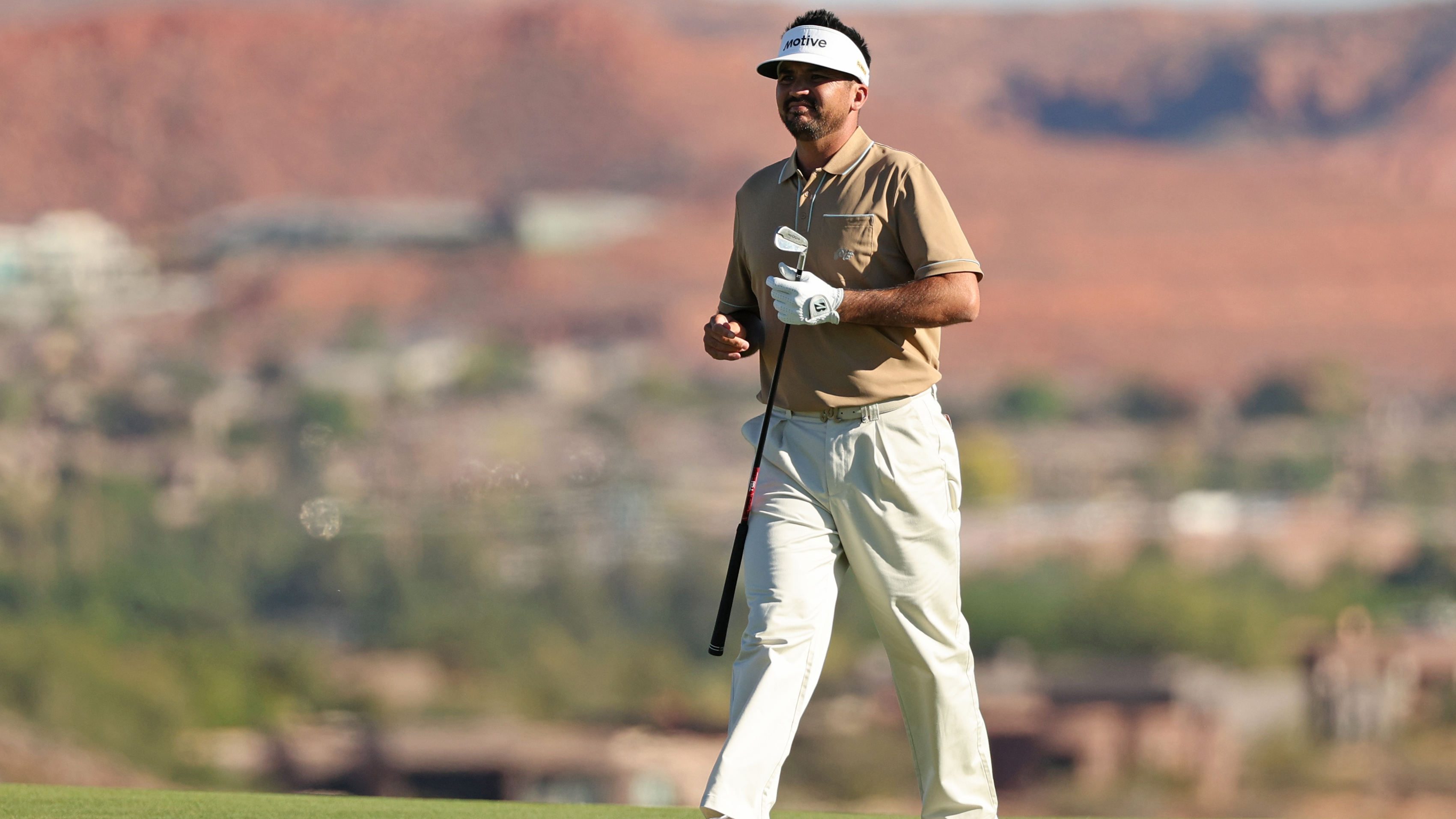 Photo of Jason Day wearing a full Malbon outift