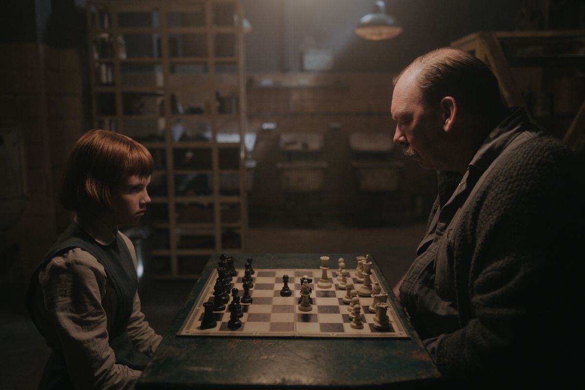 Isla Johnston as Beth Harmon and Bill Camp as Mr. Shaibel in "The Queen's Gambit" on Netflix.