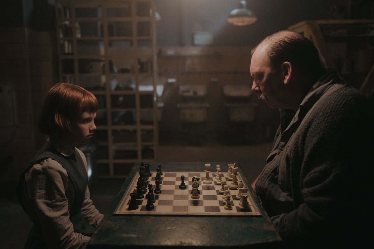 Isla Johnston as Beth Harmon and Bill Camp as Mr. Shaibel in "The Queen's Gambit" on Netflix.