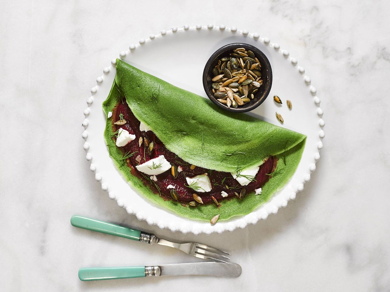 spinach crepe with beetroot puree and goat&#039;s cheese