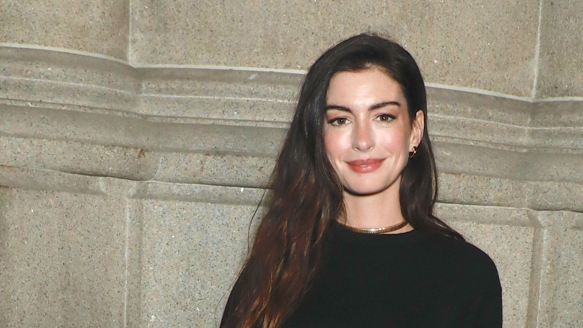 a headshot of anne hathaway